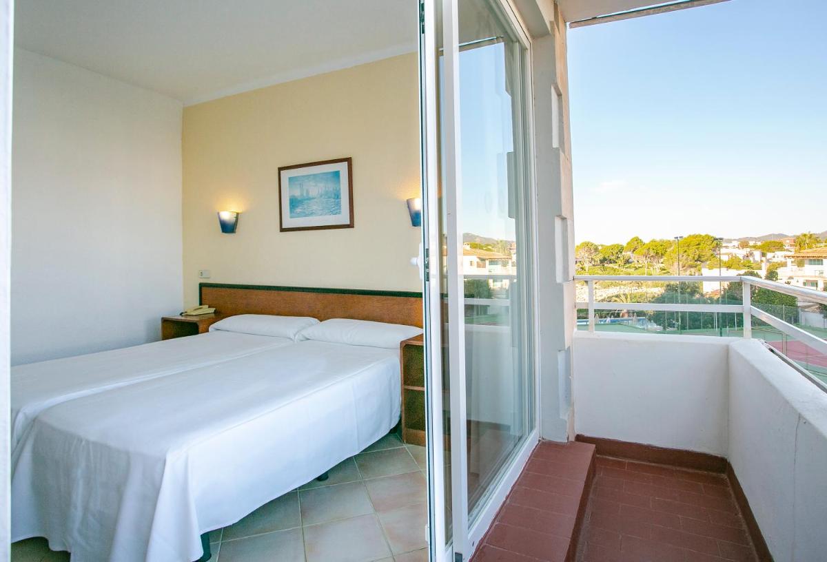 Cama o camas de una habitación en JS Cape Colom - Adults Only