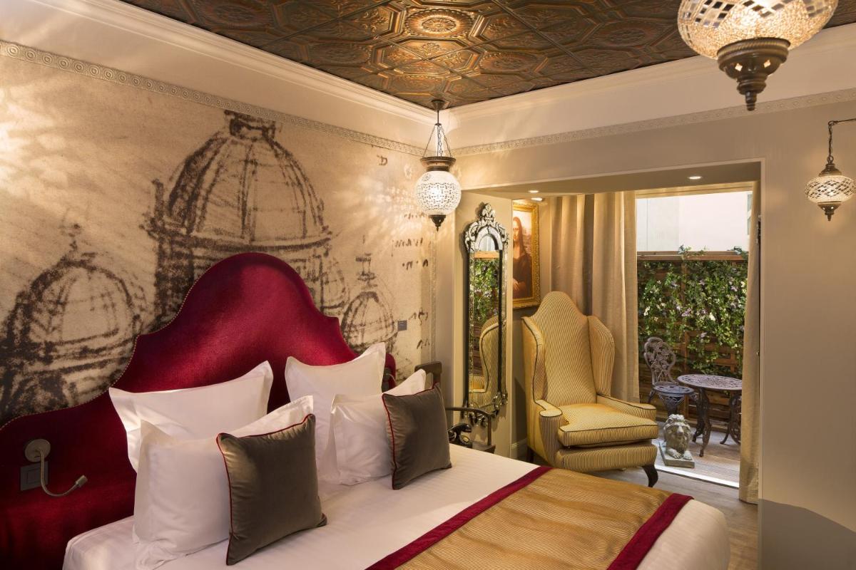 Coin salon dans l'établissement Hôtel Da Vinci & Spa