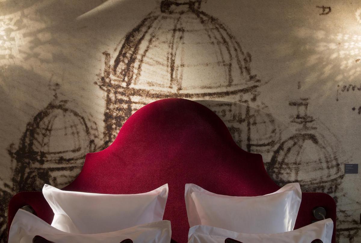 Coin salon dans l'établissement Hôtel Da Vinci & Spa