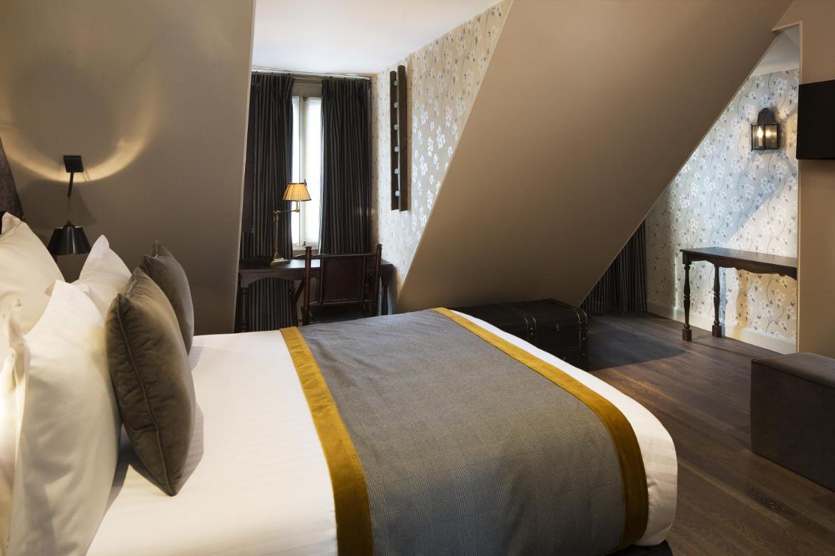 Un ou plusieurs lits dans un hébergement de l'établissement Hôtel Da Vinci & Spa