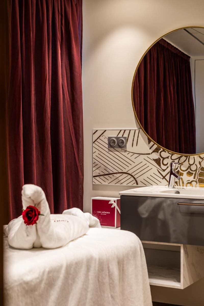 Un ou plusieurs lits dans un hébergement de l'établissement Edgar Hôtel & Spa - Table Gastronomique