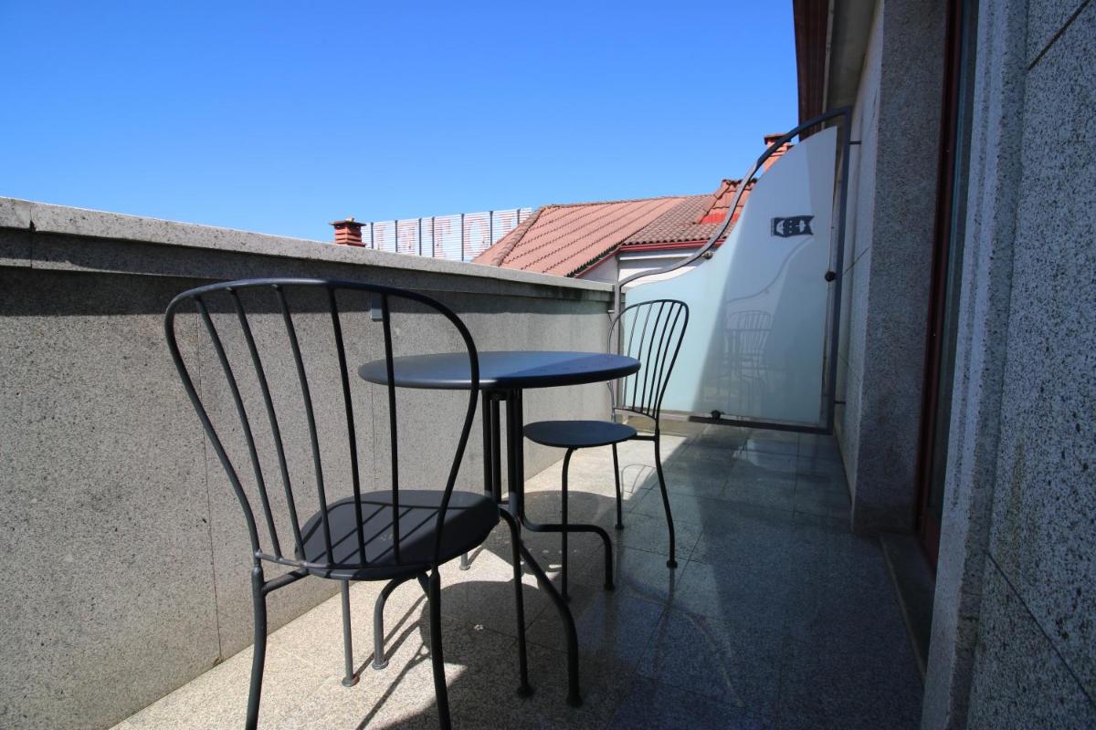 Un balcón o terraza de Hotel Alfonso I