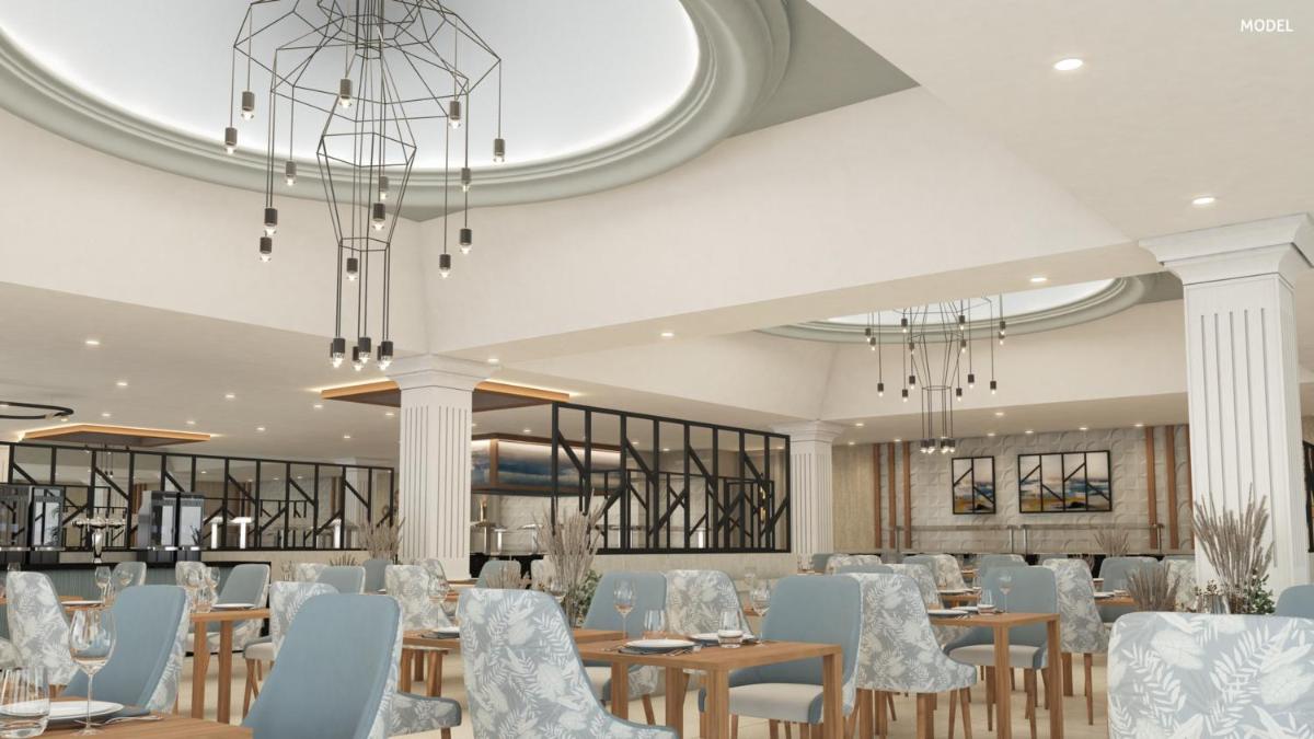 Um restaurante ou outro lugar para comer em Hotel Riu Madeira - All Inclusive