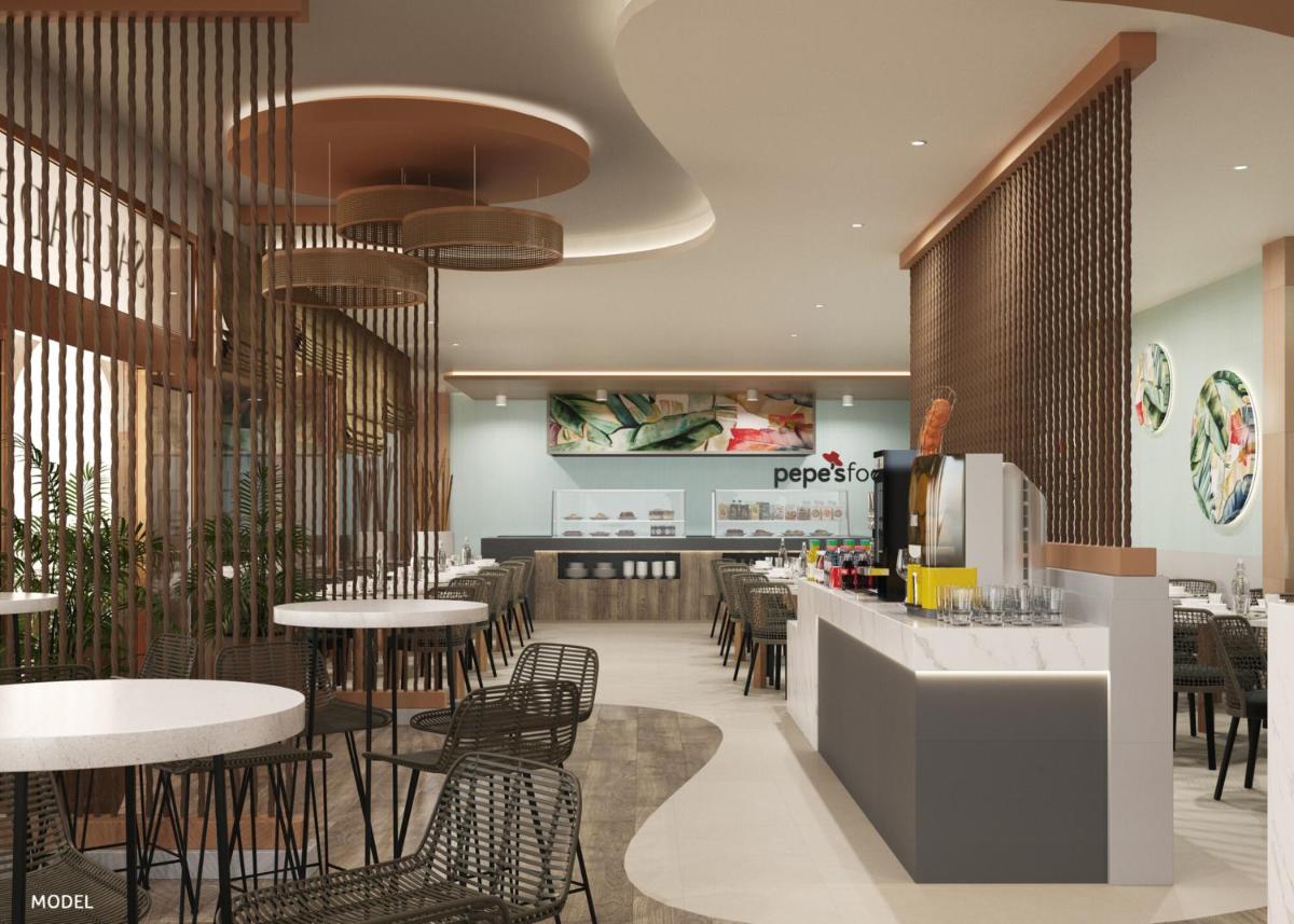 Um restaurante ou outro lugar para comer em Hotel Riu Madeira - All Inclusive