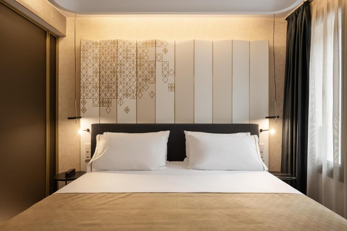 Cama o camas de una habitación en Áurea Palacio de Correos by Eurostars Hotel Company