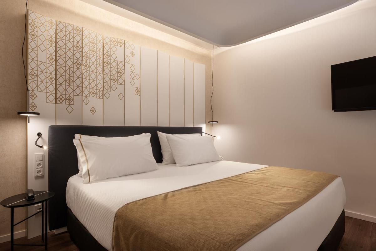 Cama o camas de una habitación en Áurea Palacio de Correos by Eurostars Hotel Company