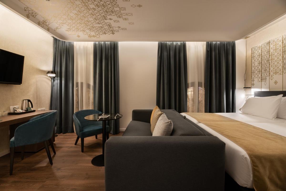 Cama o camas de una habitación en Áurea Palacio de Correos by Eurostars Hotel Company