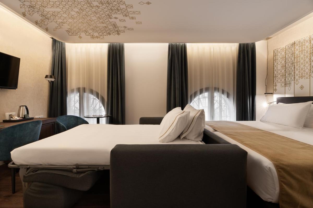 Cama o camas de una habitación en Áurea Palacio de Correos by Eurostars Hotel Company