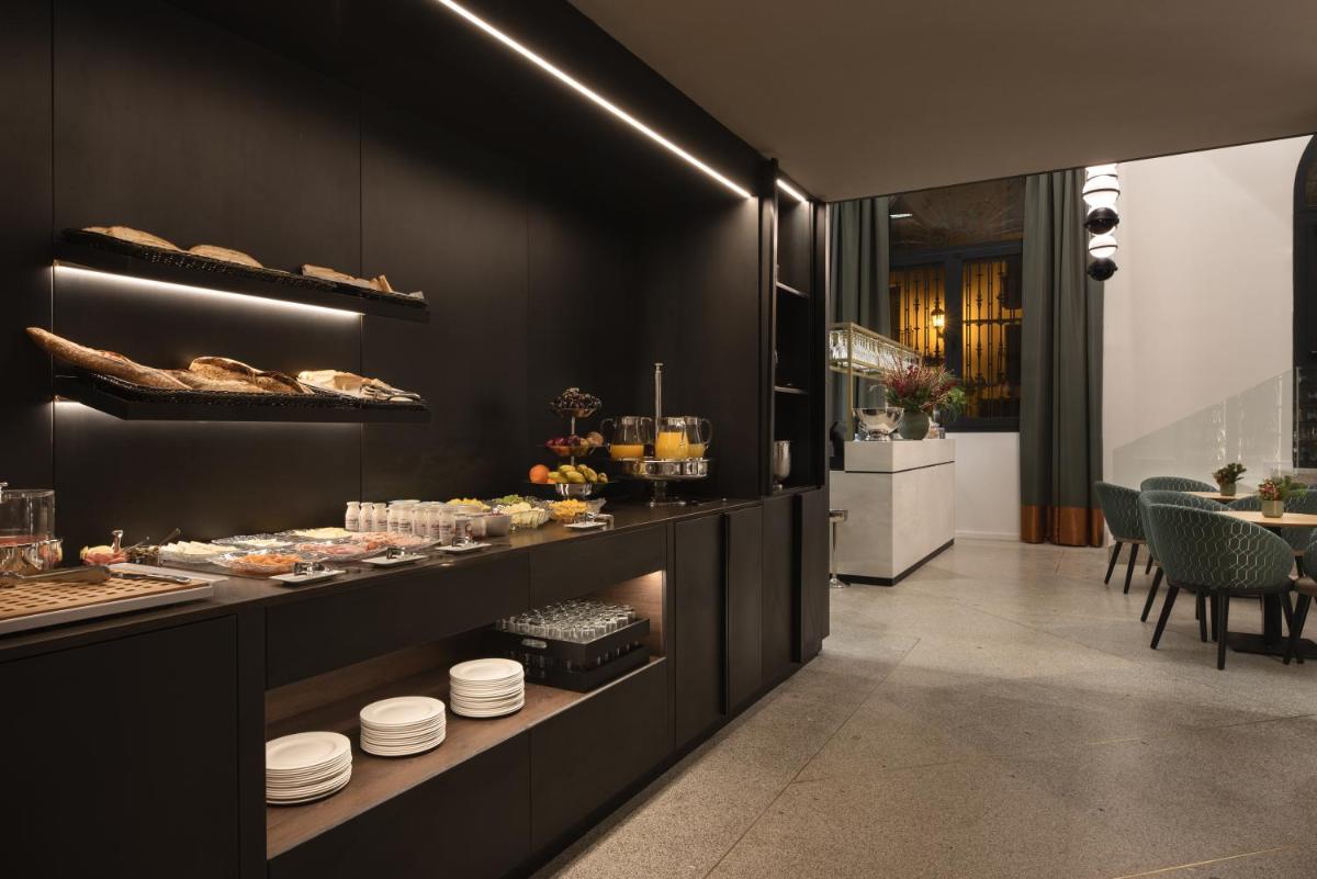 Una cocina o zona de cocina en Áurea Palacio de Correos by Eurostars Hotel Company