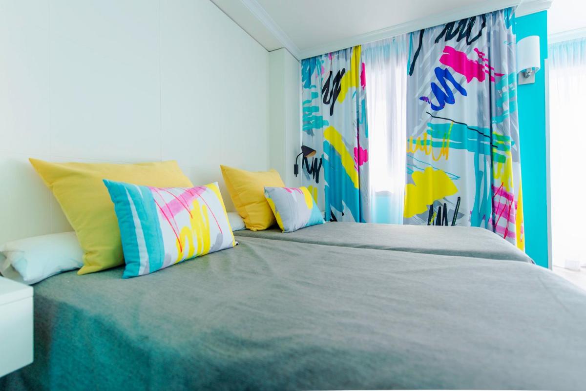 Cama o camas de una habitación en Spring Hotel Bitácora