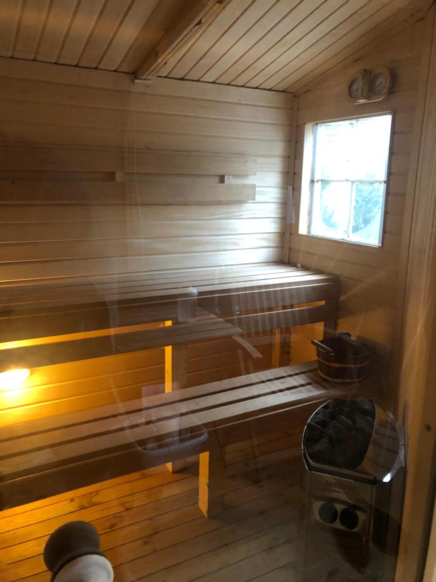 1-bedroom apartment-rooftop JAKUZZI-hot tub, BBQ & SAUNA in a FOREST by the BEACH - Housity