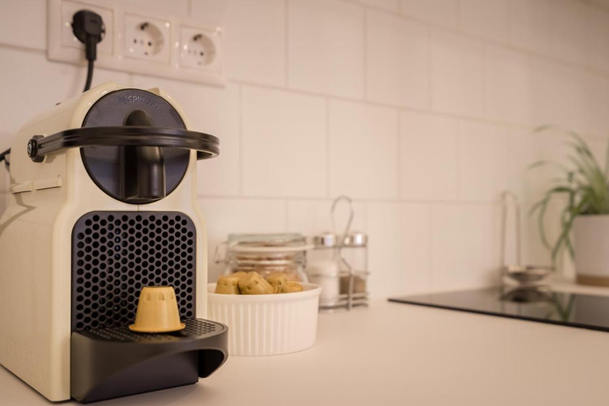 ROOMLI Boho Chic Apartments - Housity