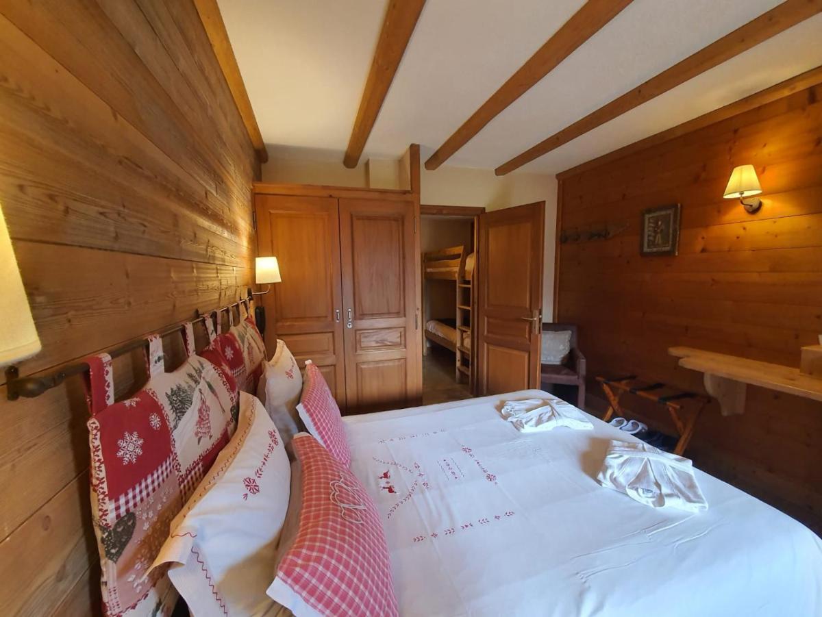 Un ou plusieurs lits dans un hébergement de l'établissement Café-Hôtel Le Morillon, Domaine du Grand Massif-Samoëns