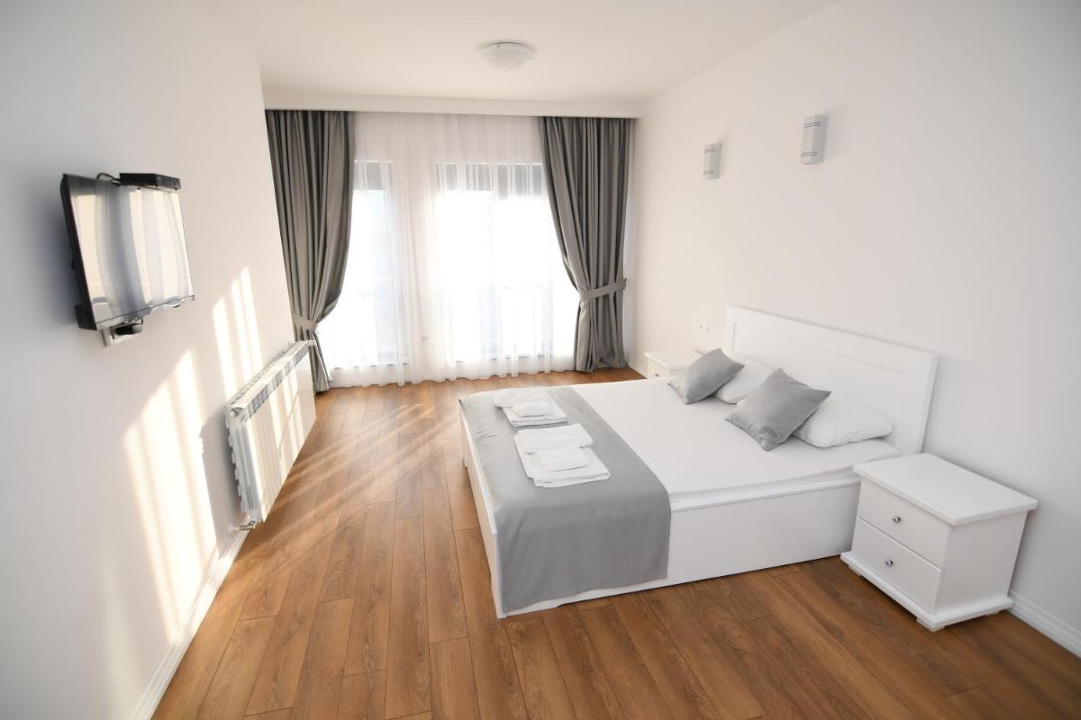 Elan Luxury Apartments & Rooms - Housity