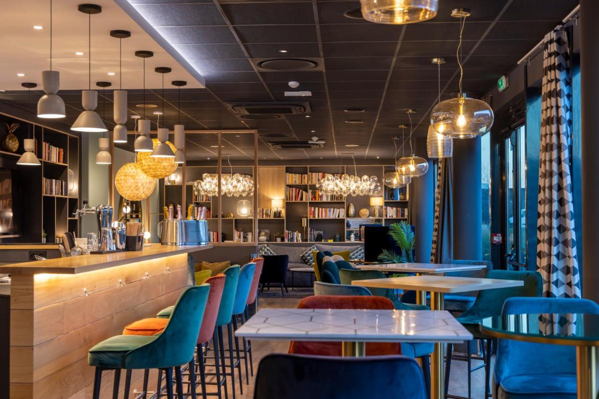 Coin salon dans l'établissement PADJA Hôtel & Spa Vannes