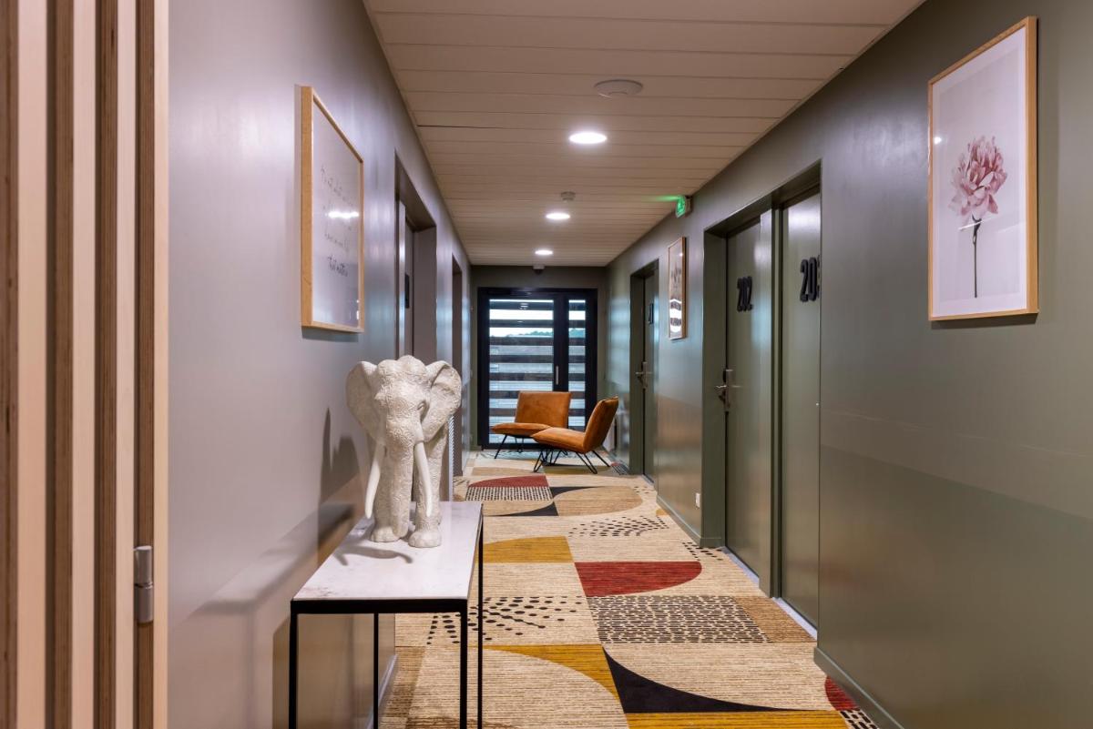 Coin salon dans l'établissement PADJA Hôtel & Spa Vannes