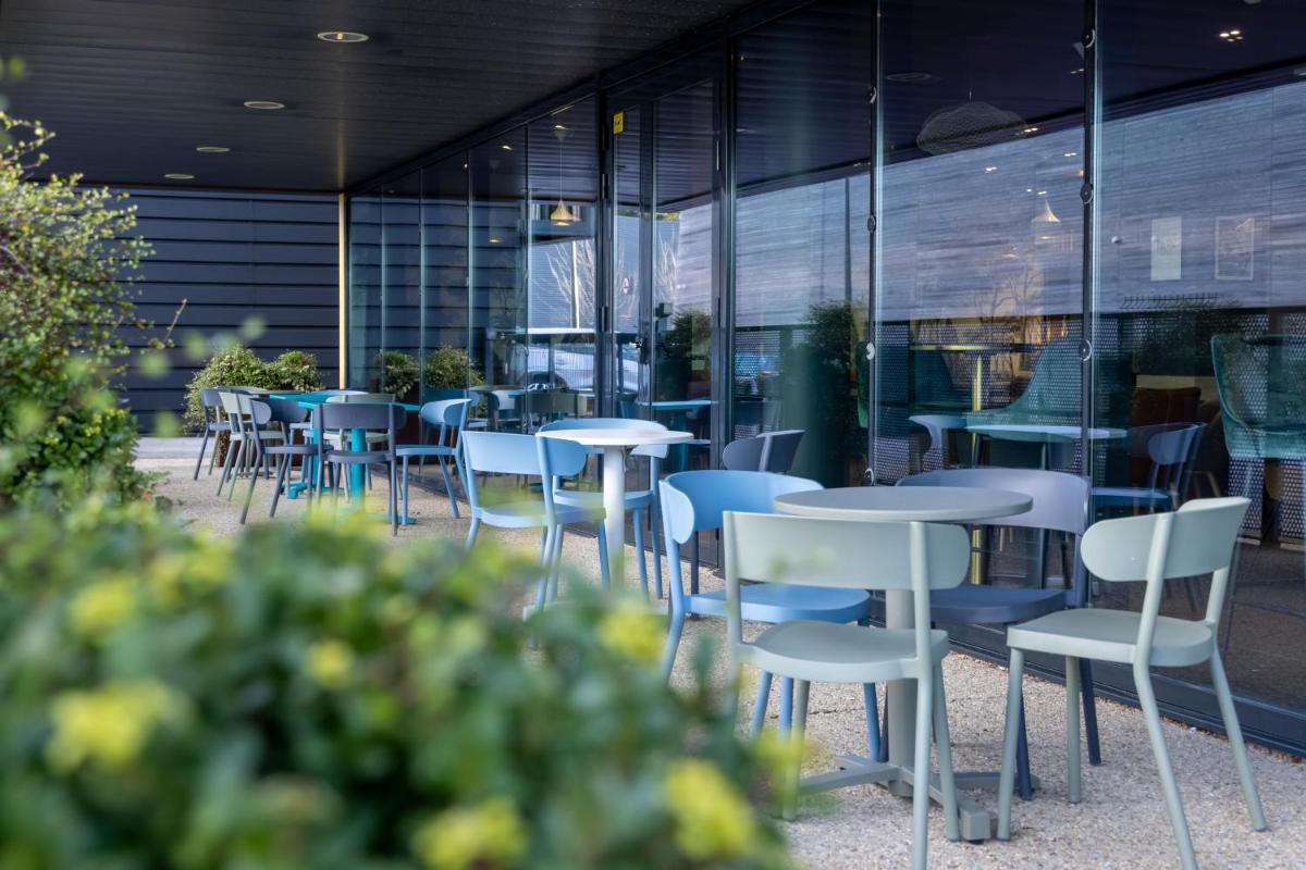 Restaurant ou autre lieu de restauration dans l'établissement PADJA Hôtel & Spa Vannes