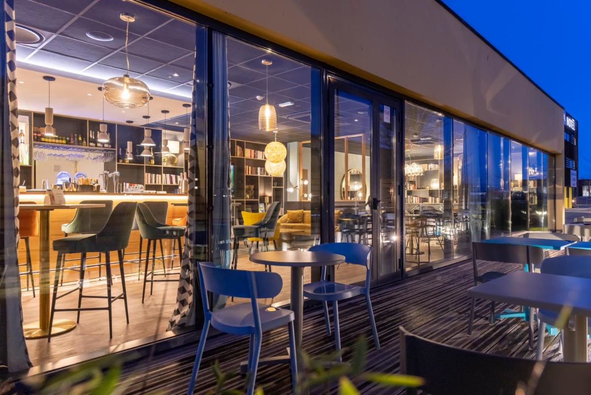 Restaurant ou autre lieu de restauration dans l'établissement PADJA Hôtel & Spa Vannes