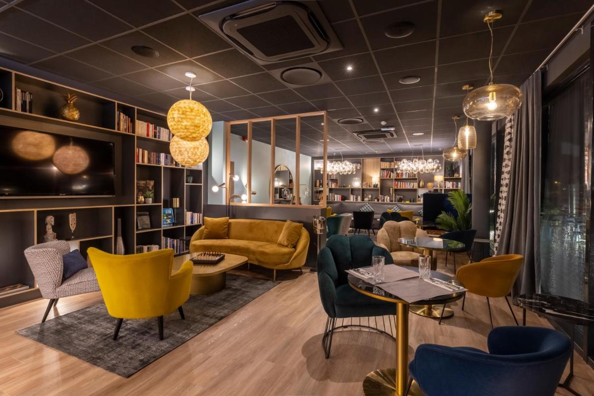 Coin salon dans l'établissement PADJA Hôtel & Spa Vannes