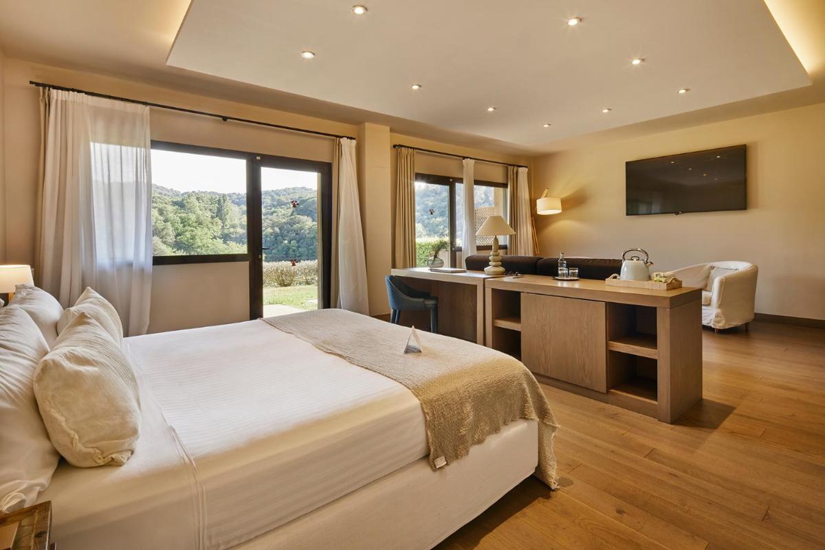 Cama o camas de una habitación en Mas Salagros EcoResort & SPA