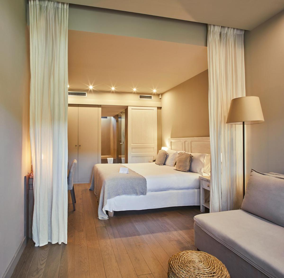Cama o camas de una habitación en Mas Salagros EcoResort & SPA
