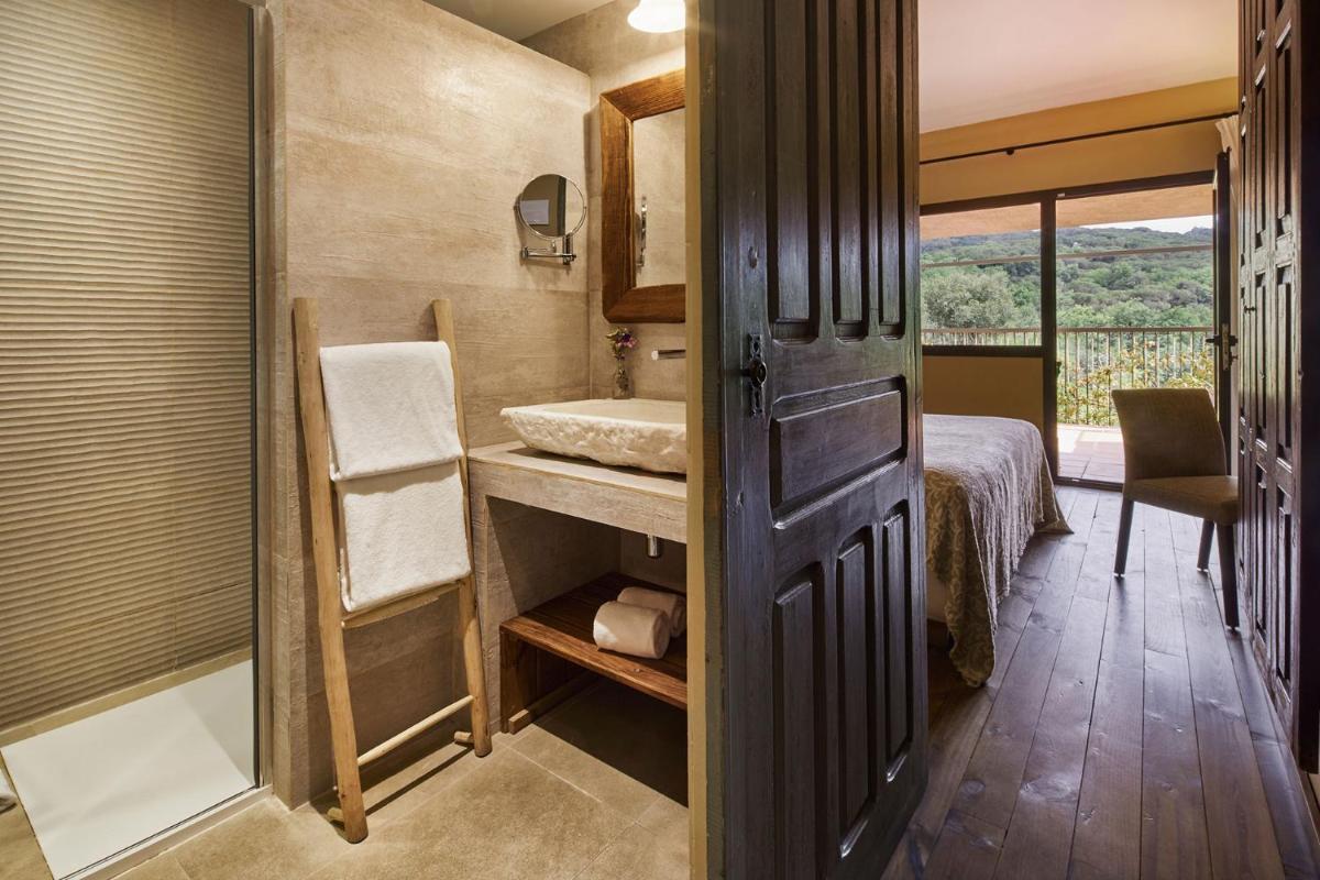 Cama o camas de una habitación en Mas Salagros EcoResort & SPA