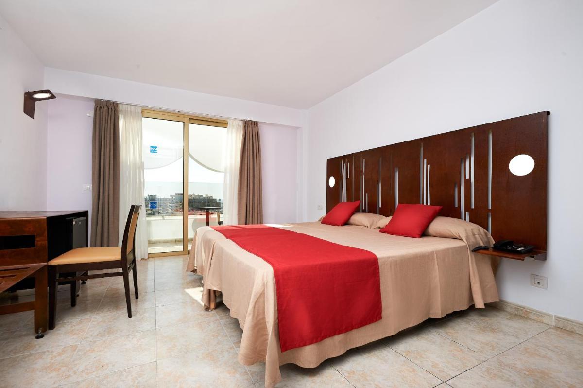 Cama o camas de una habitación en Kn Aparthotel Columbus