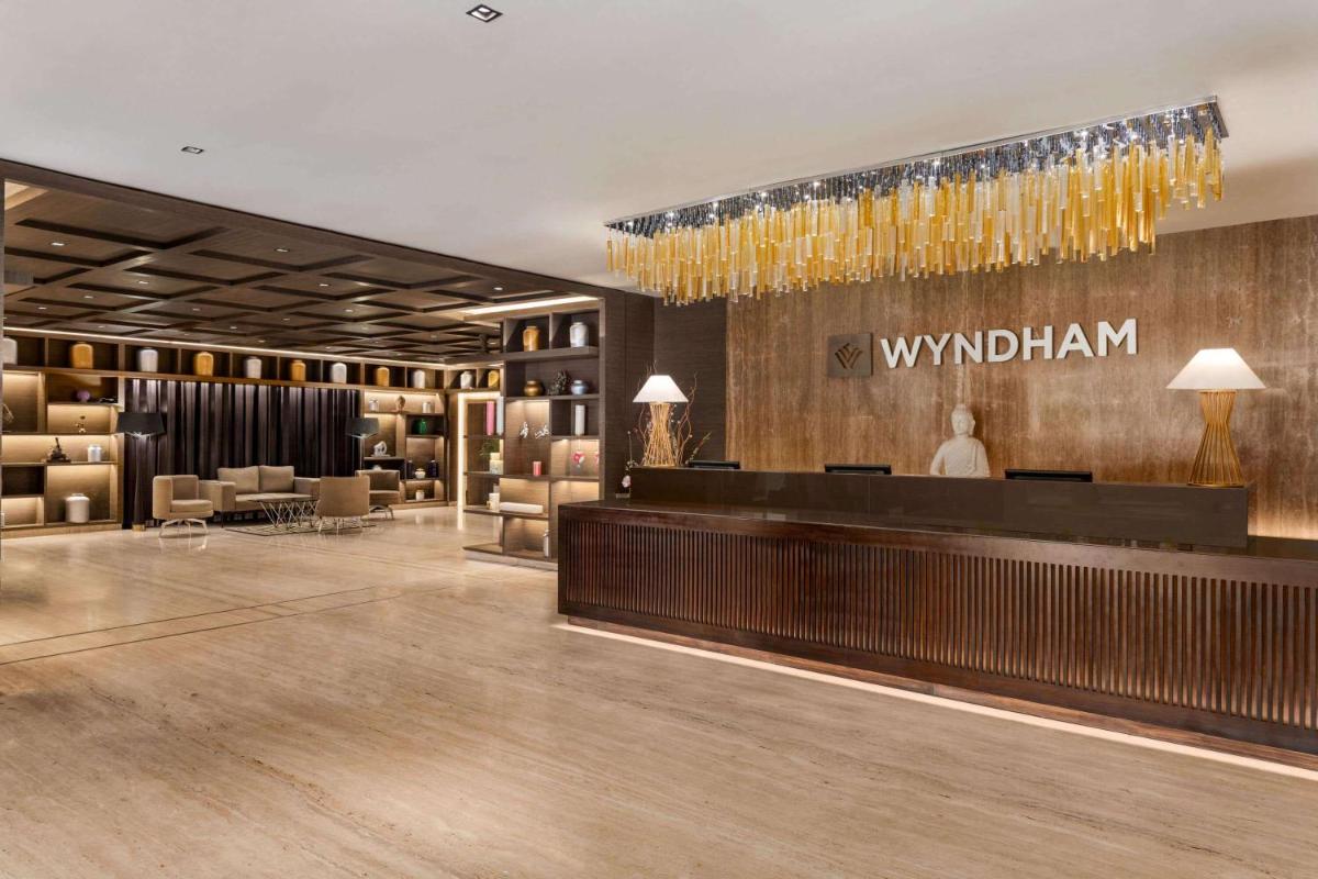 a rendering of the lobby of a wynelandelandeland at Wyndham Ahmedabad Shela in Ahmedabad