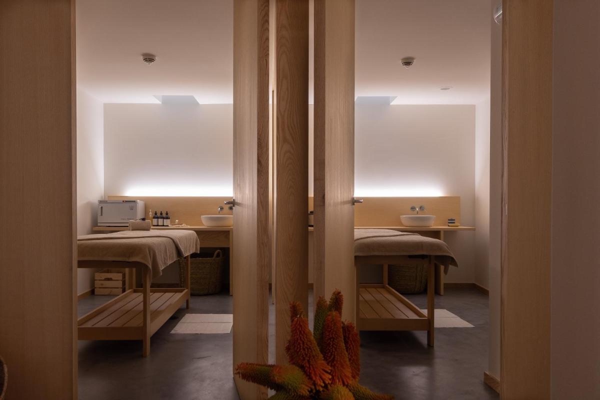 Uma cama ou camas num quarto em Hotel Meira