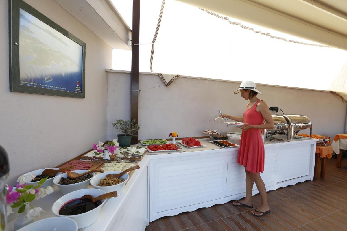 Tymnos Hotel - Housity