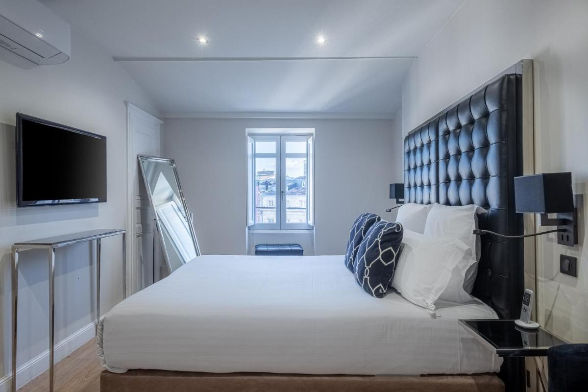 Télévision ou salle de divertissement dans l'établissement Le Boutique Hotel & Spa