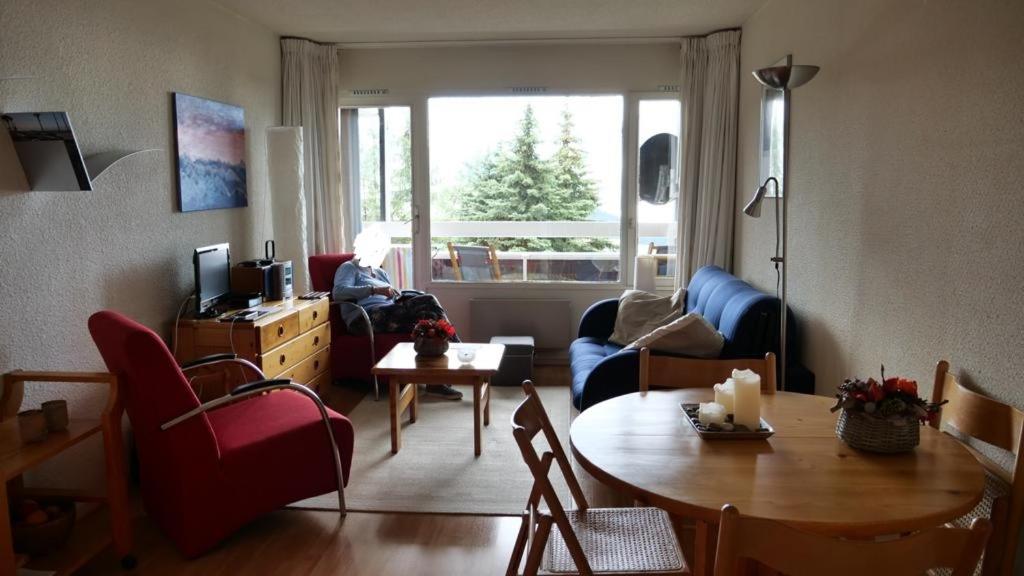 Suitetrails - appartement dans Residence du Roche Mantel -alpes huez face a l'AlpExpress