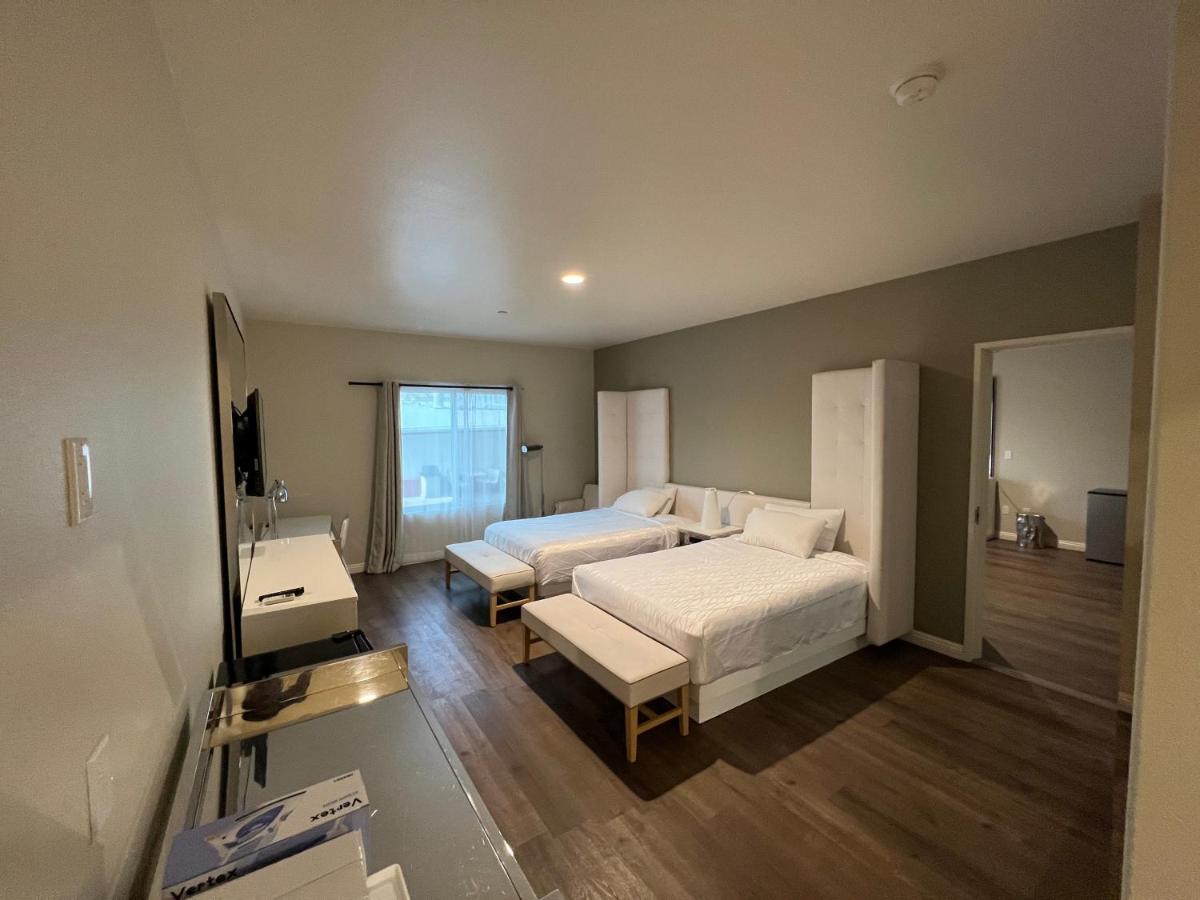 ASPIRE INN & SUITES Orange - Housity