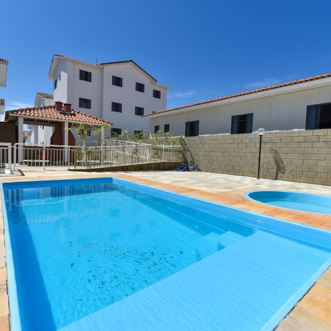 D01 Apto com estacionamento, piscina e churrasqueira - Housity