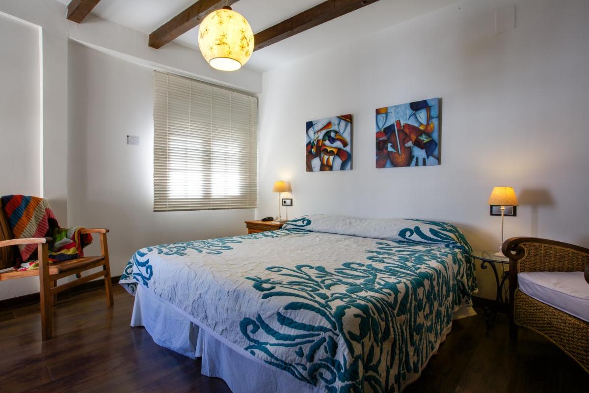 Cama o camas de una habitación en La Posada del Casar