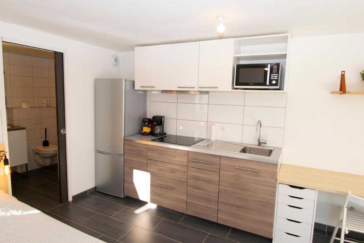 Studio 002 neuf proche gare TGV, A36 et Hôpital - Housity