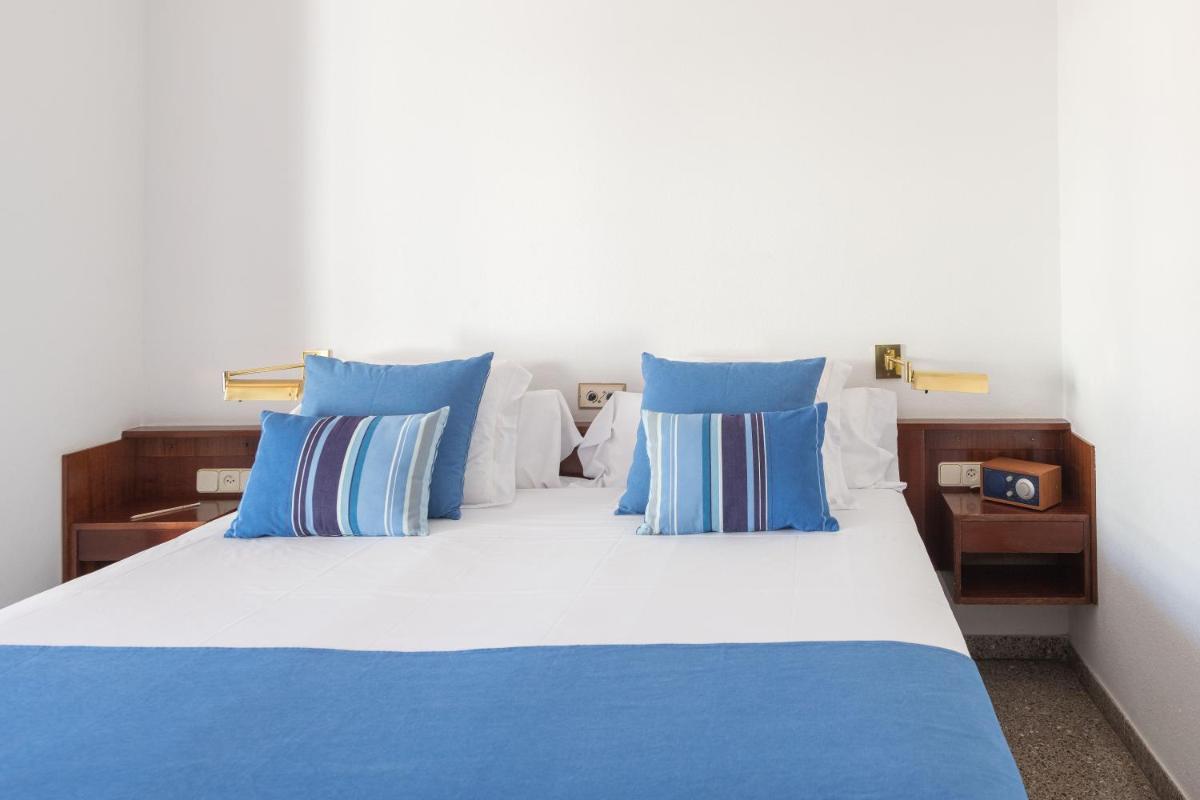 Cama o camas de una habitación en Almadraba Park Hotel