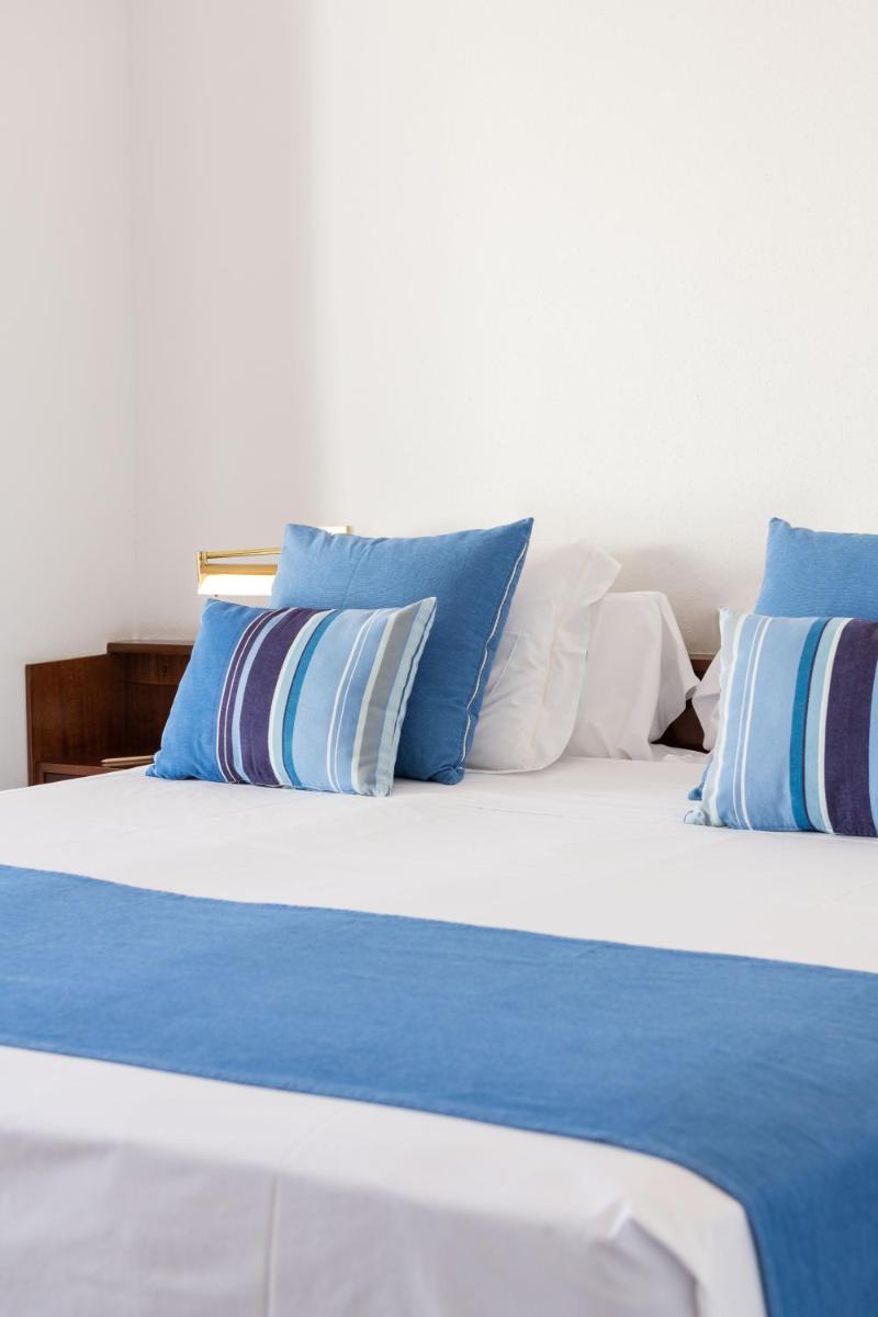 Cama o camas de una habitación en Almadraba Park Hotel