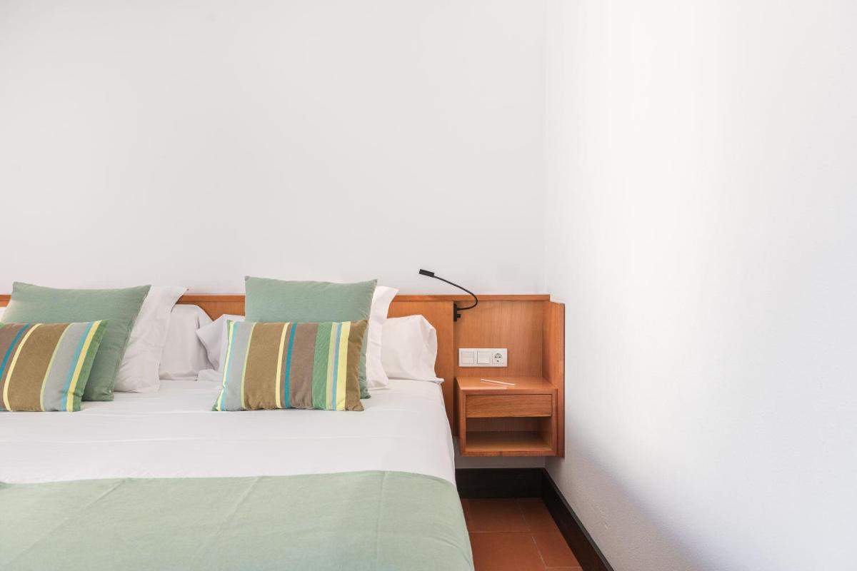 Cama o camas de una habitación en Almadraba Park Hotel
