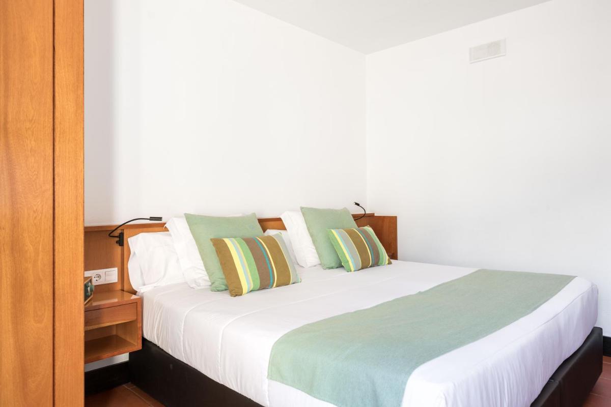 Cama o camas de una habitación en Almadraba Park Hotel