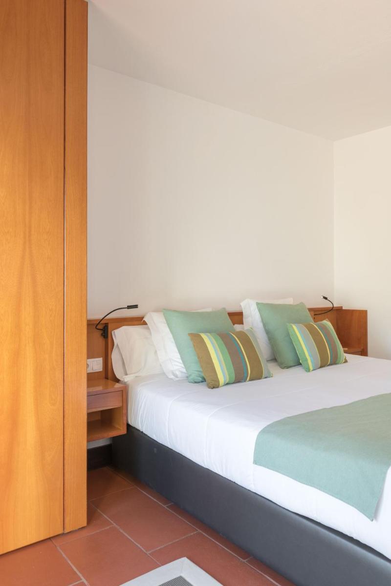 Cama o camas de una habitación en Almadraba Park Hotel