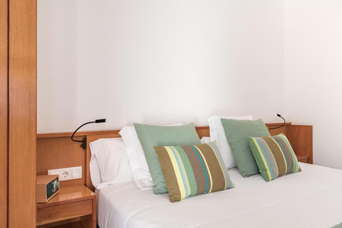 Cama o camas de una habitación en Almadraba Park Hotel