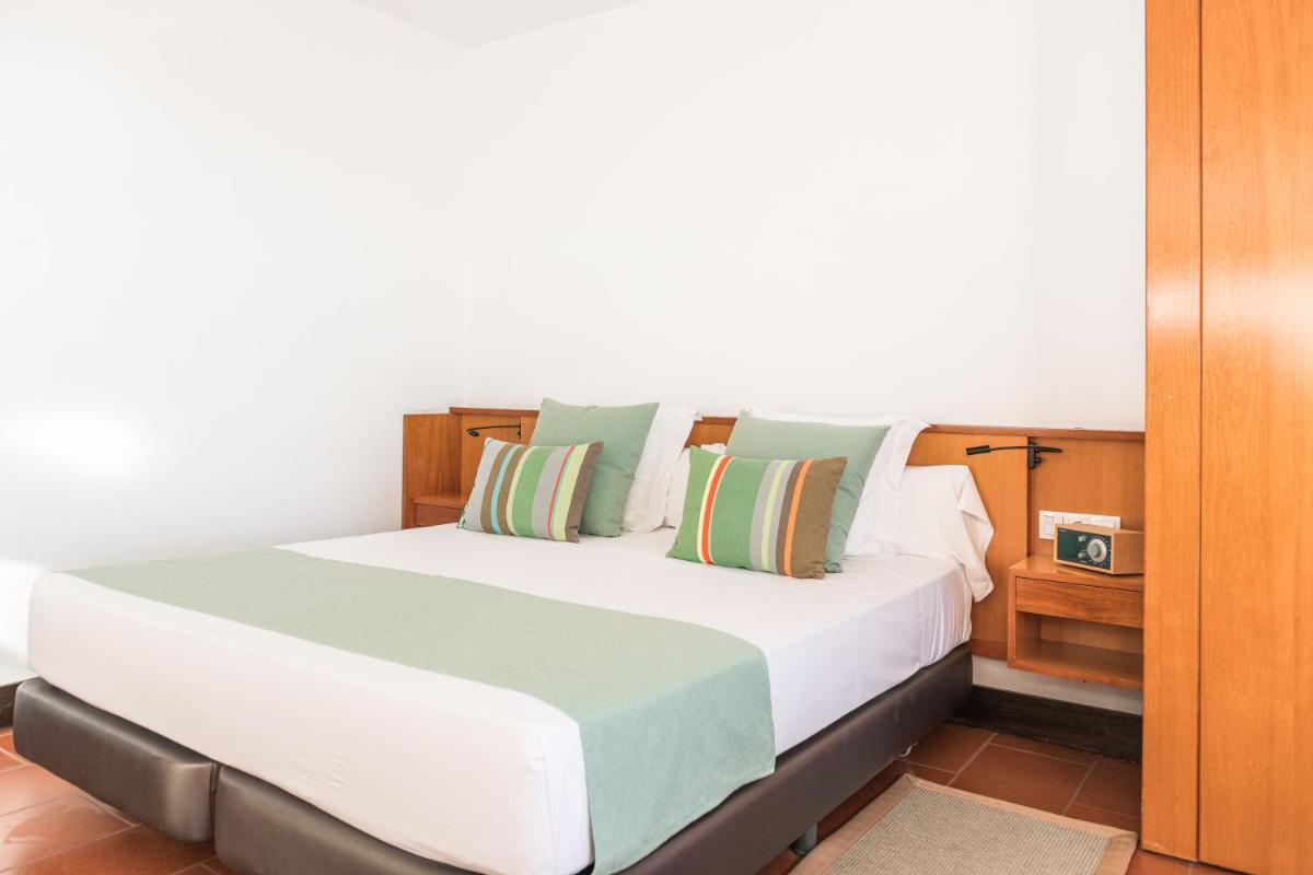 Cama o camas de una habitación en Almadraba Park Hotel
