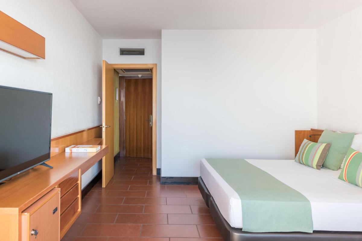 Cama o camas de una habitación en Almadraba Park Hotel