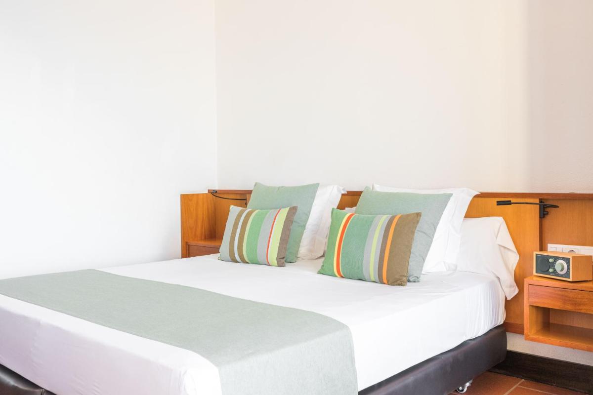 Cama o camas de una habitación en Almadraba Park Hotel