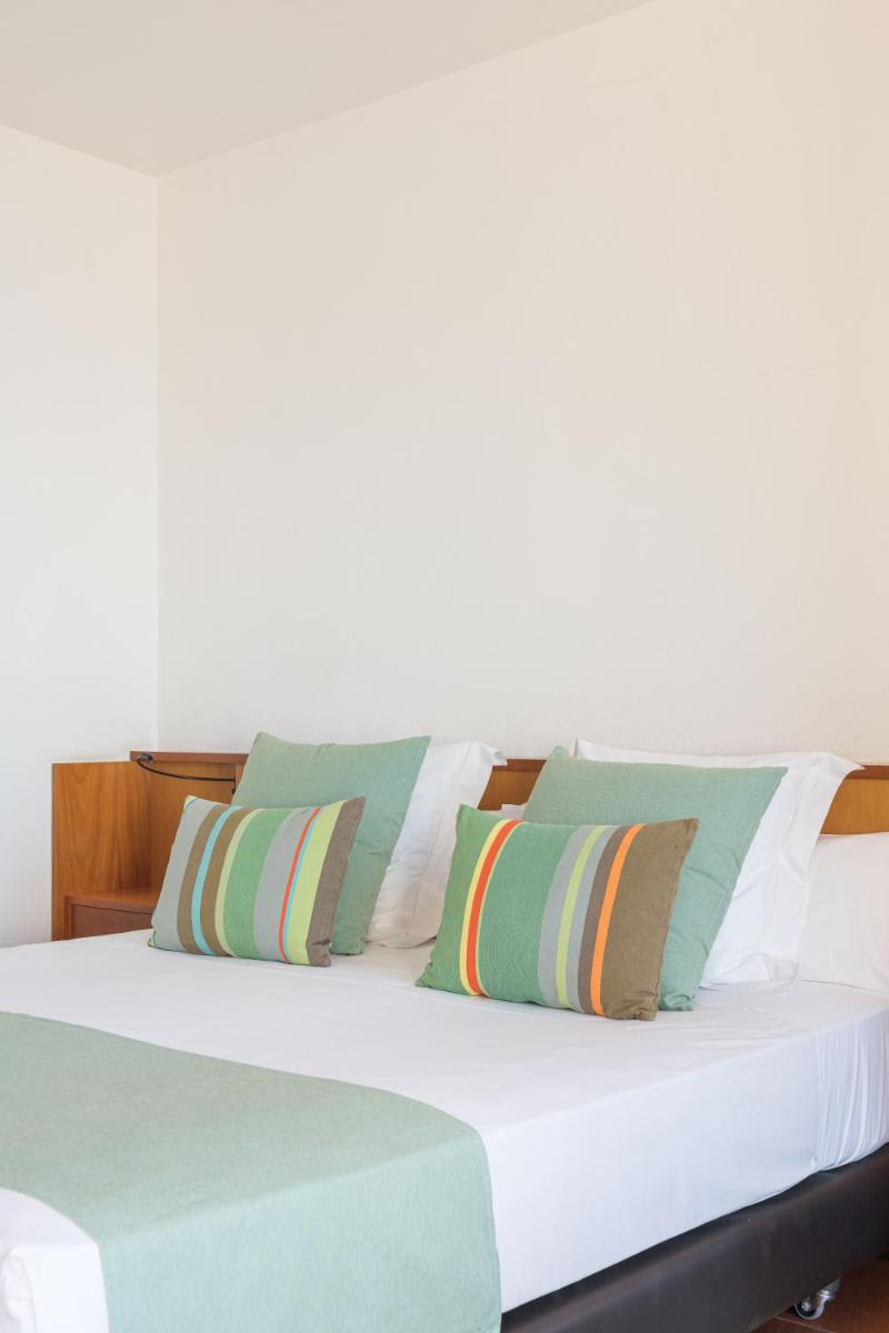 Cama o camas de una habitación en Almadraba Park Hotel