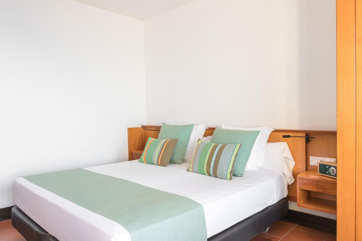 Cama o camas de una habitación en Almadraba Park Hotel