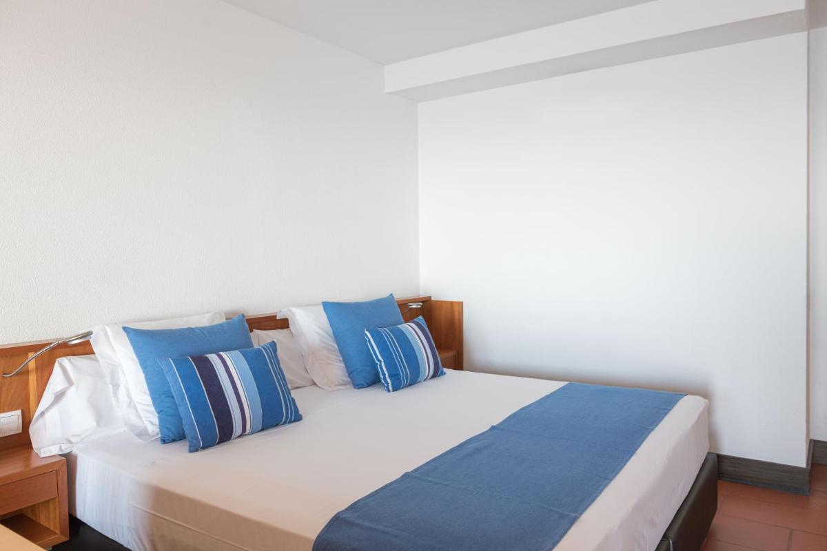 Cama o camas de una habitación en Almadraba Park Hotel