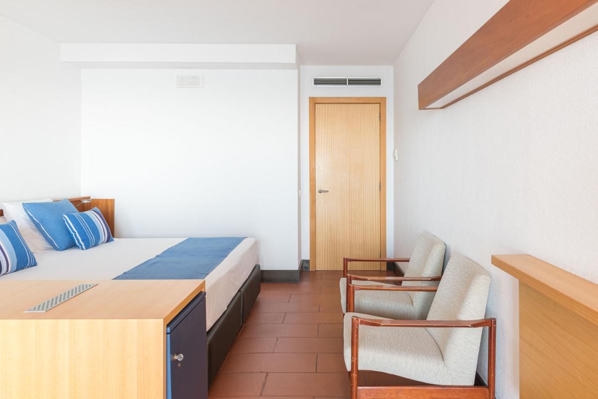 Cama o camas de una habitación en Almadraba Park Hotel