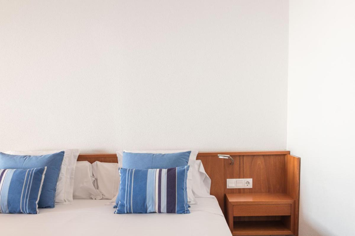Cama o camas de una habitación en Almadraba Park Hotel
